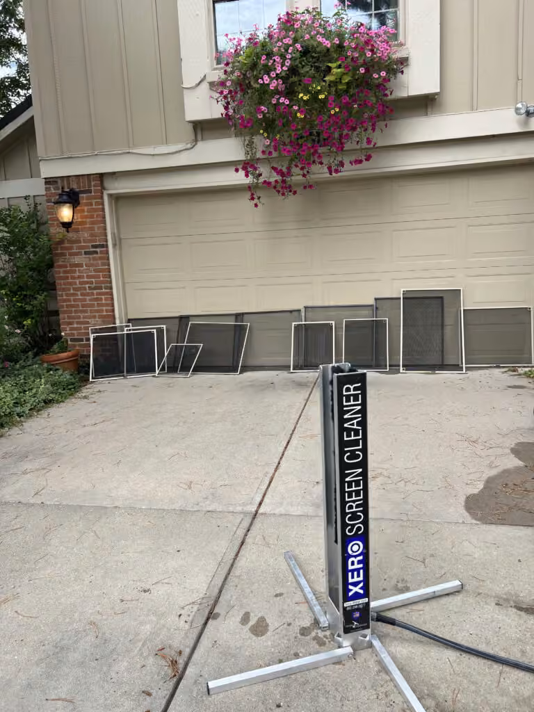 Pane Pros Window Cleaning equipment set up to clean window screens